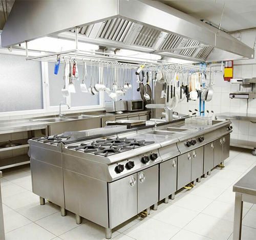 Cooking equipment in the source commercial-kitchen photograph