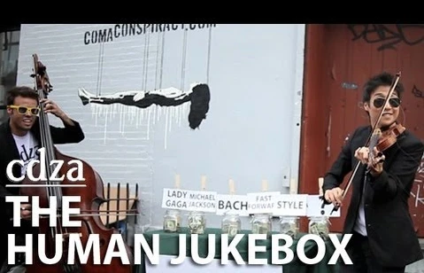 Michael Thurber and Charles Yang in the CDZA Human Jukebox image reproduced in From the Top’s 2012–2013 report