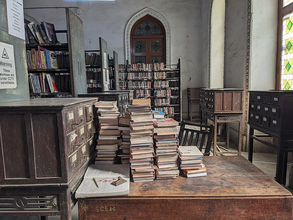 Books arranged on a library table