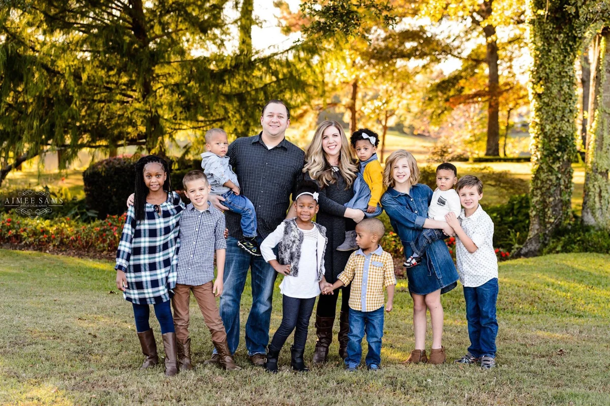 A family group photographed outdoors
